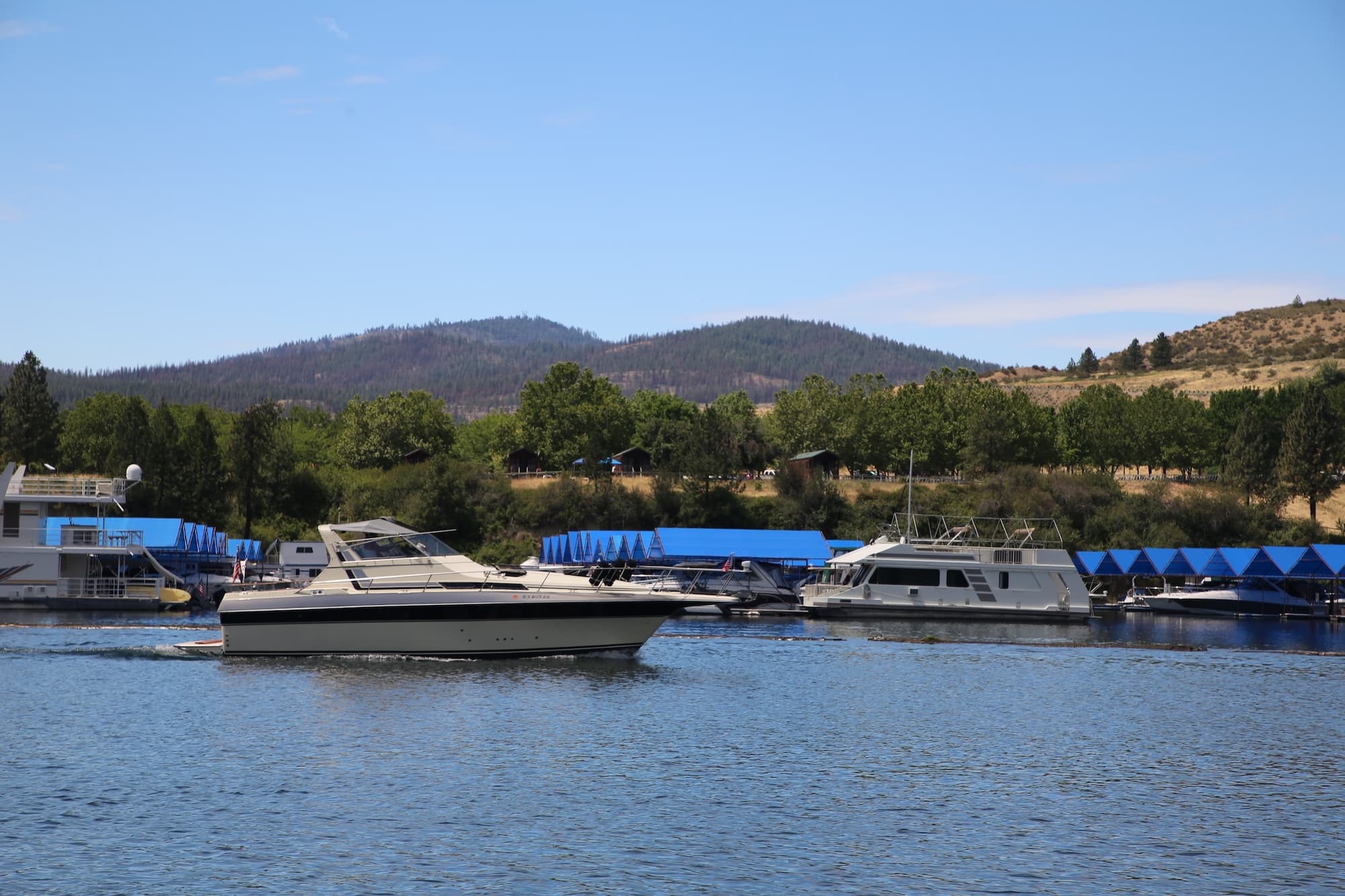 Boat riding through Two Rivers Marina